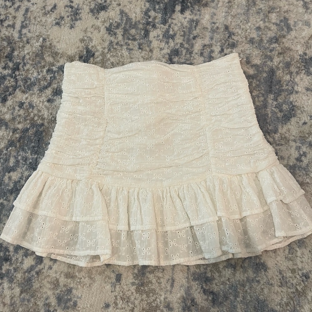 White eyelet mini skirt